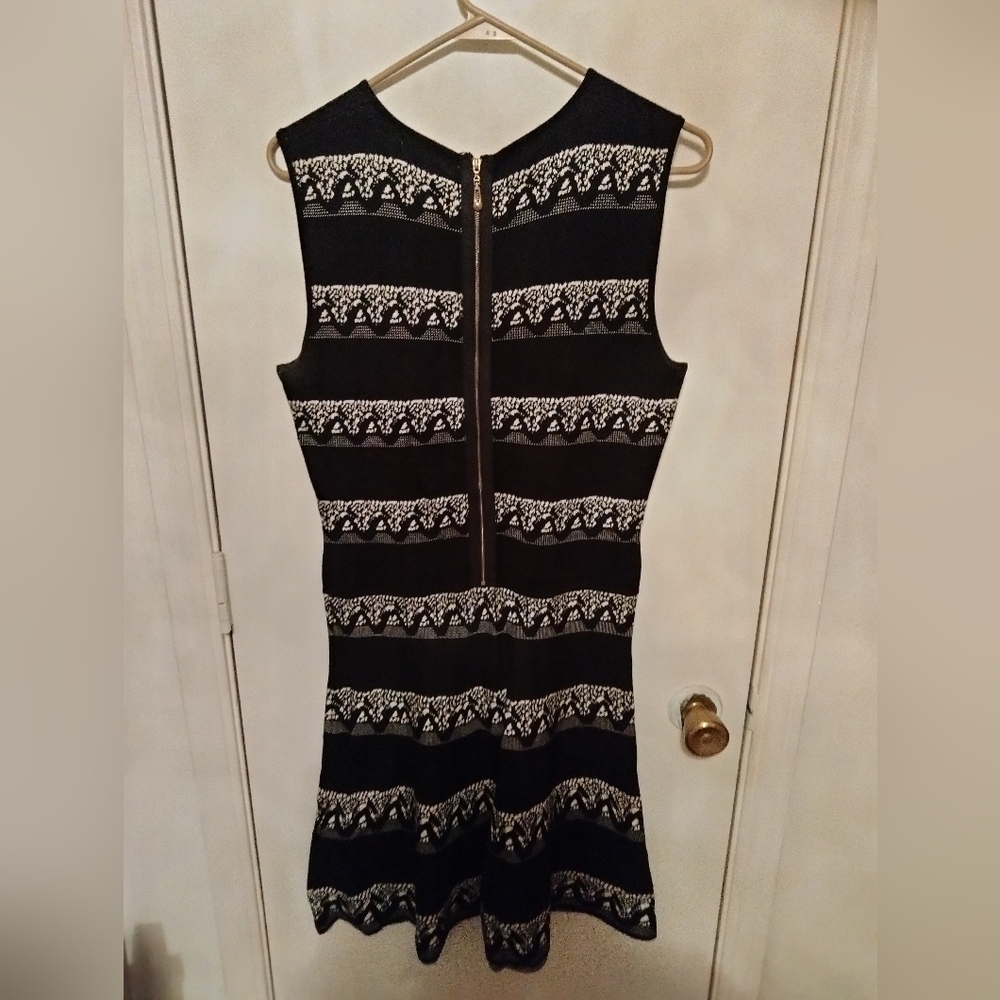 Black and white Maxi sweater dress, size medium with no pockets and sleeveless.